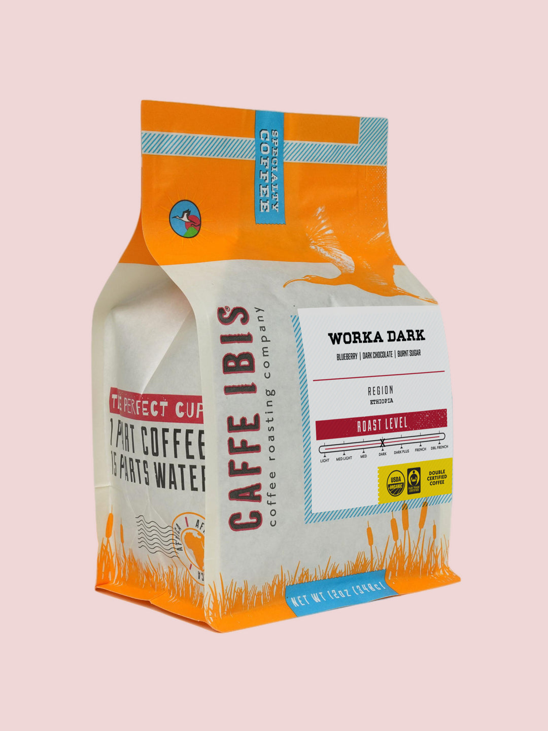 Caffe Ibis Organic Worka Dark in an orange twelve ounce bag; front quarter view.